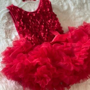 Very cute valentines red ruffle dress for 12 months baby girl.
